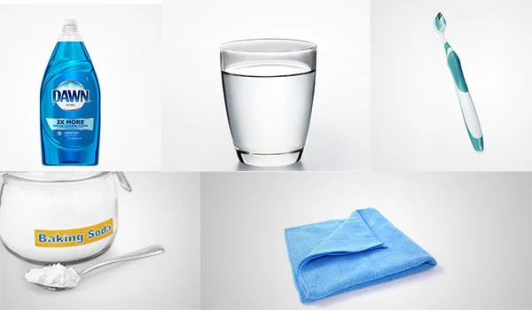 some dish soap, some warm water, a clean toothbrush, a microfiber cloth, some rubbing alcohol, a little baking soda